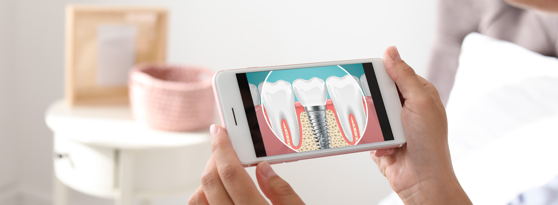 The image shows a hand holding a smartphone displaying an animated toothbrush with bristles and paste, suggesting dental hygiene or oral care theme, possibly for educational or promotional purposes.