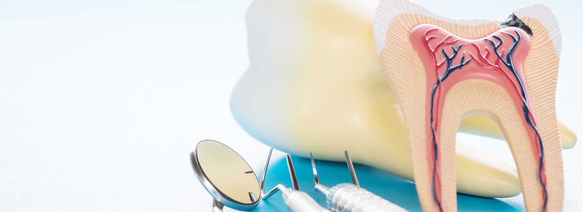 An advertisement image featuring an oral care product with a toothbrush, toothpaste, and dental floss, accompanied by a graphic of a mouth with teeth and gums, set against a light blue background.